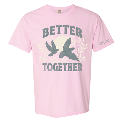 Pink t-shirt with 'Better Together' text and dove design on a white background