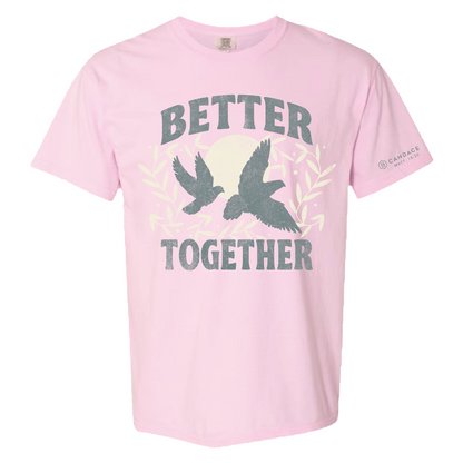 Pink t-shirt with 'Better Together' text and dove design on a white background