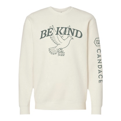 White sweatshirt with 'BE KIND' text and dove graphic on a white background